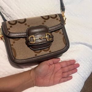 Gucci Brown jumbo GG crossbody bag.  Horsebit style.